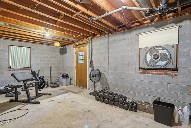 a view of livingroom with washer and dryer