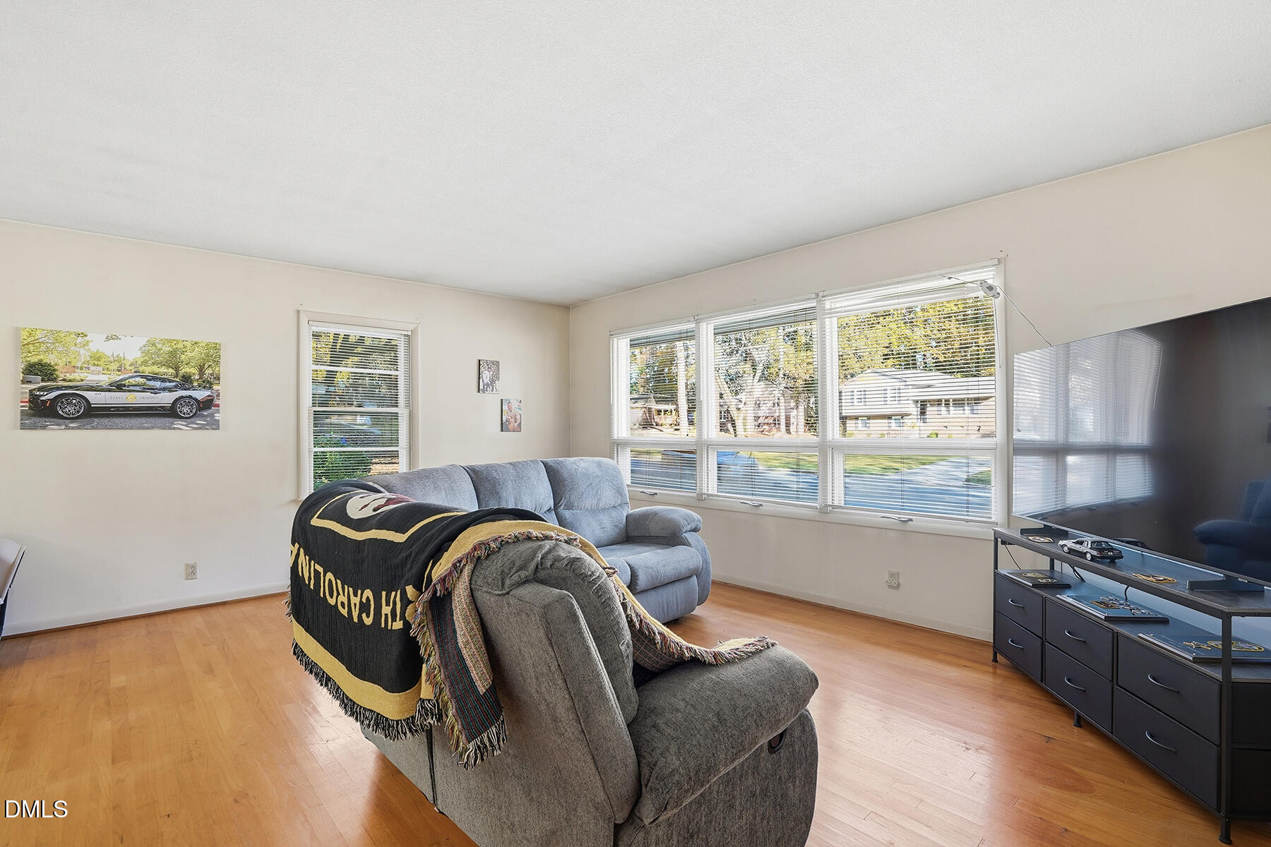 3216 Broyhill Circle Raleigh, NC 27604 - Photo 7 of 32 a living room with furniture and a large window