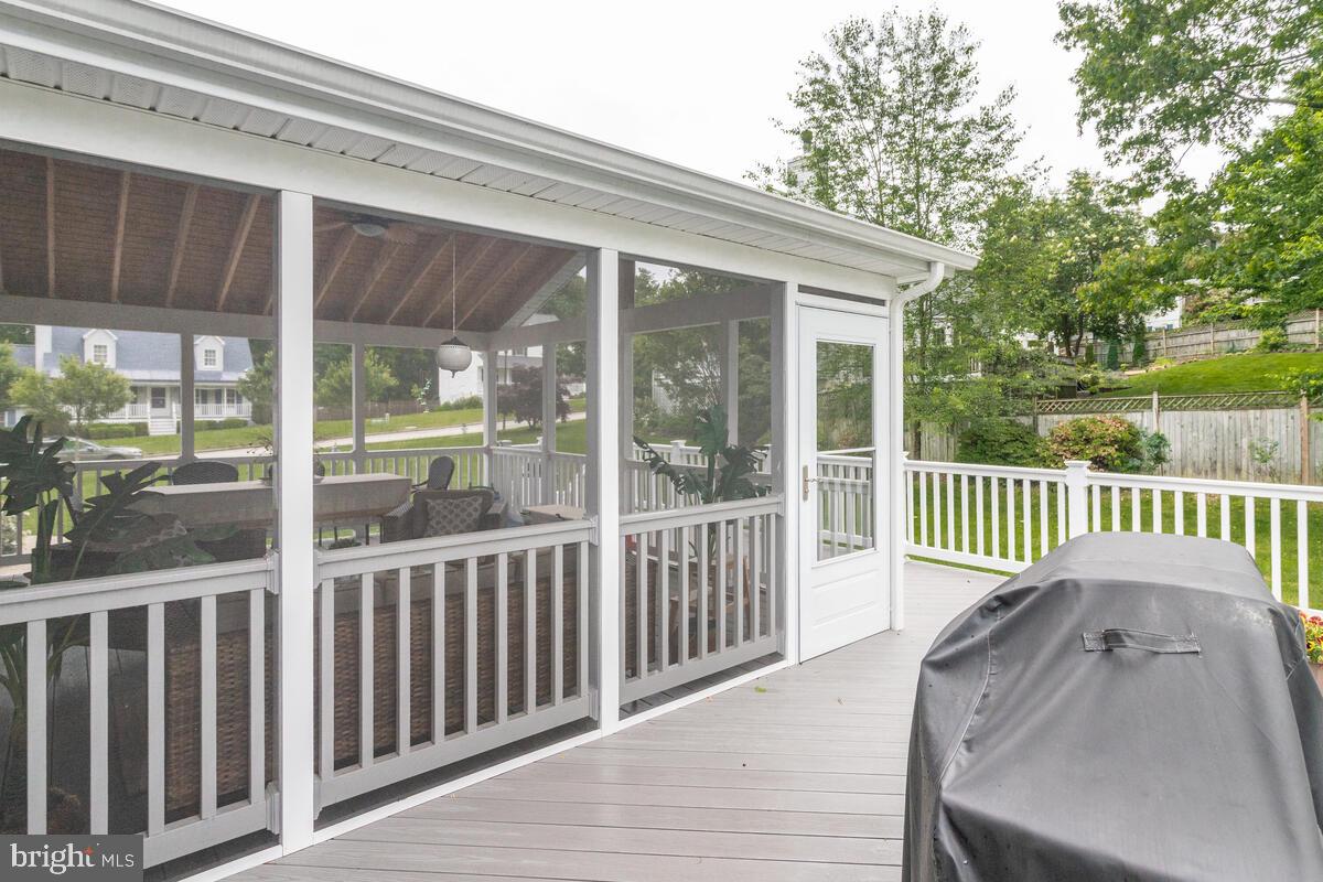 6505 Walker Branch Drive Laurel, MD 20707 - Photo 14 of 60 deck wraps around screened porch