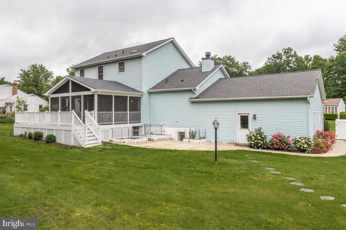 6505 Walker Branch Drive Laurel, MD 20707 - Photo 53 of 60 Screened porch, patio and garage back door