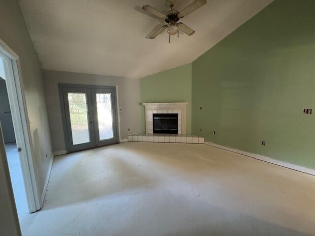 446 John King Road Crestview, FL 32539 - Photo 6 of 14 an empty room with fireplace and windows