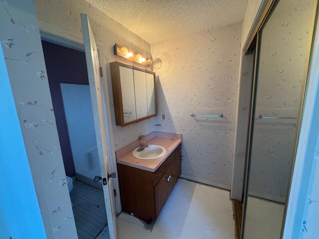 446 John King Road Crestview, FL 32539 - Photo 7 of 14 a bathroom with a sink a mirror and a toilet