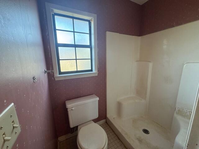 446 John King Road Crestview, FL 32539 - Photo 8 of 14 a white toilet sitting next to a bathroom sink