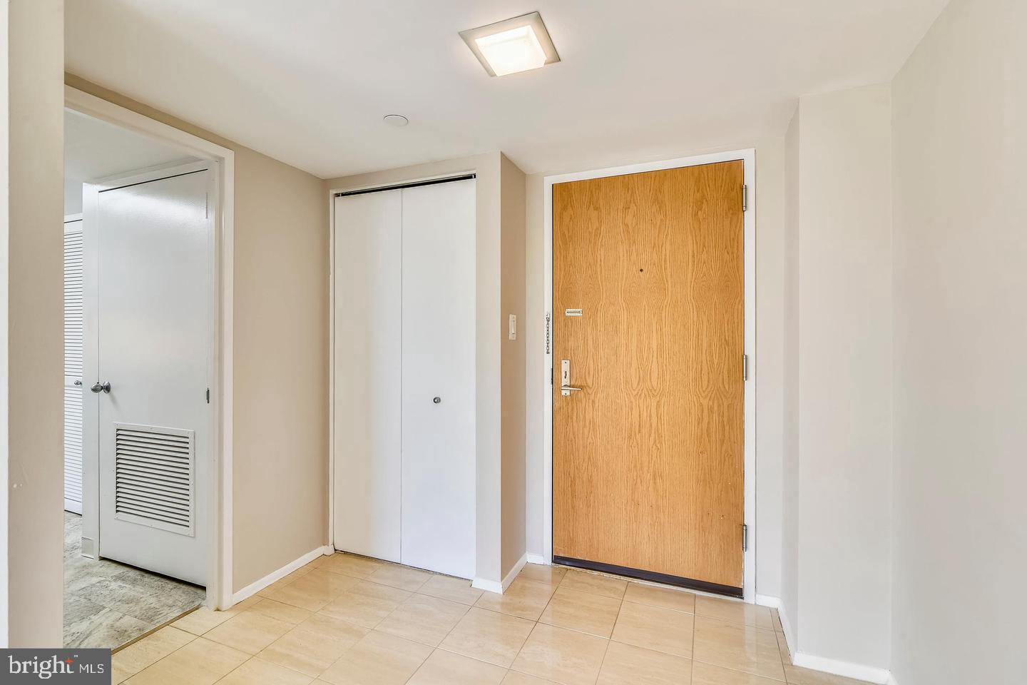 1808 Old Meadow Road, Unit 910 McLean, VA 22102 - Photo 6 of 28 Entrance with a coat closet.