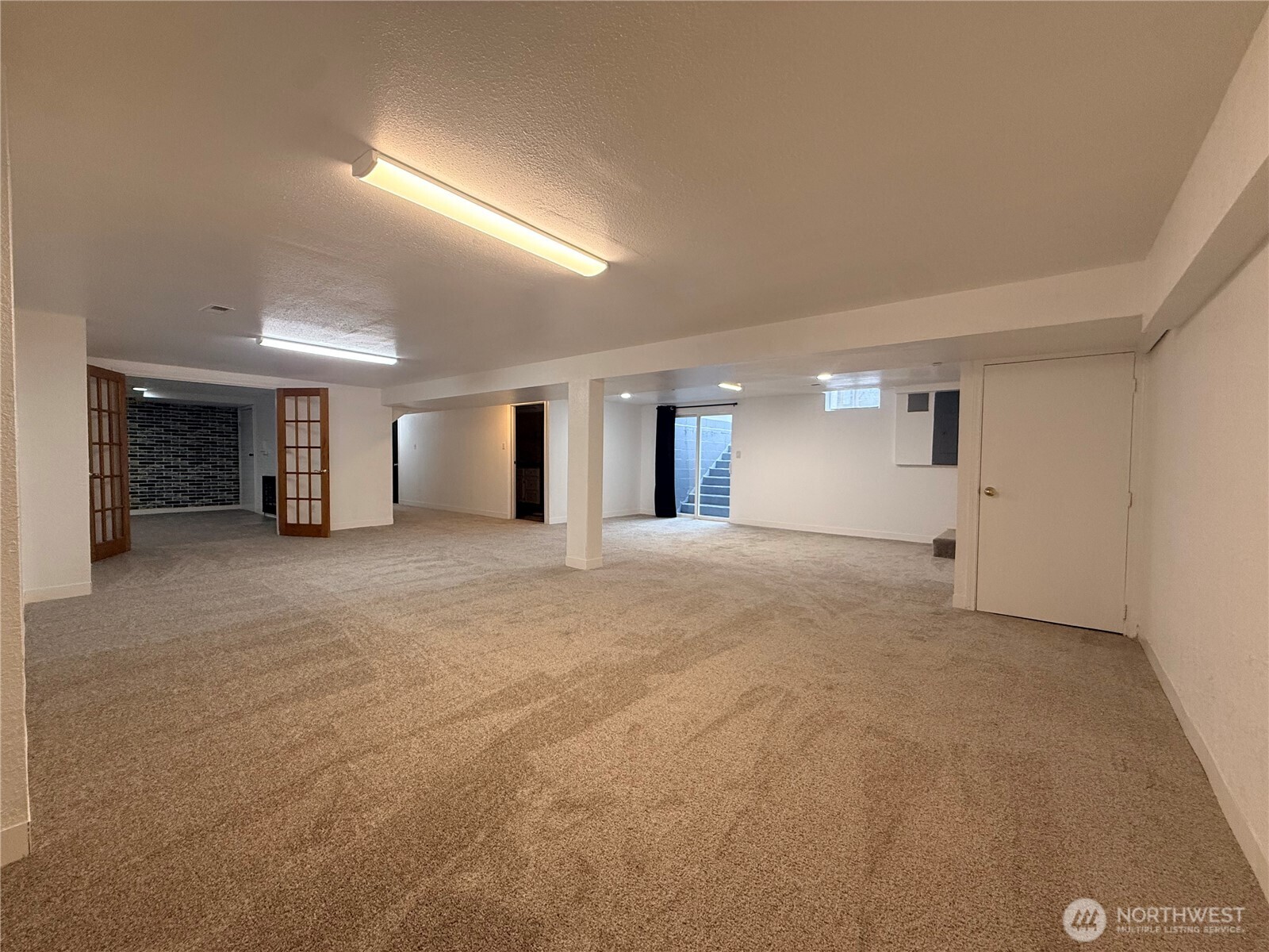 2126 Lewis River Road Woodland, WA 98674 - Photo 19 of 23 a view of a big room with closet and windows