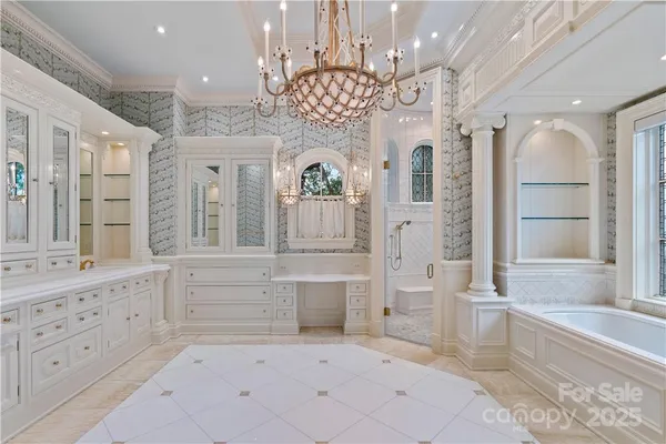 a bathroom with a bathtub and shower