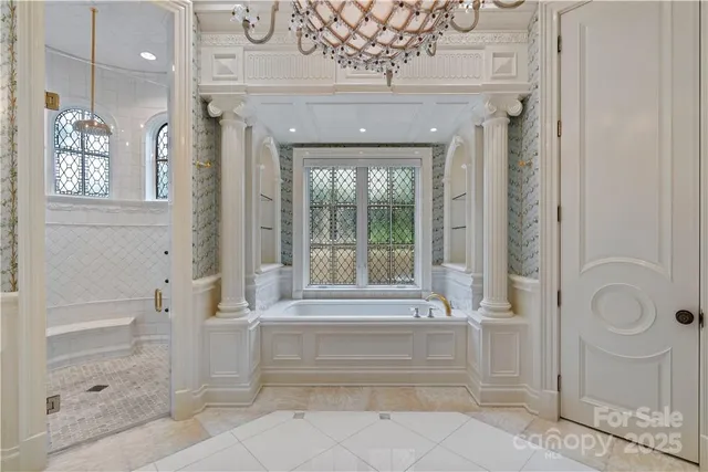 a view of a livingroom with furniture and entryway