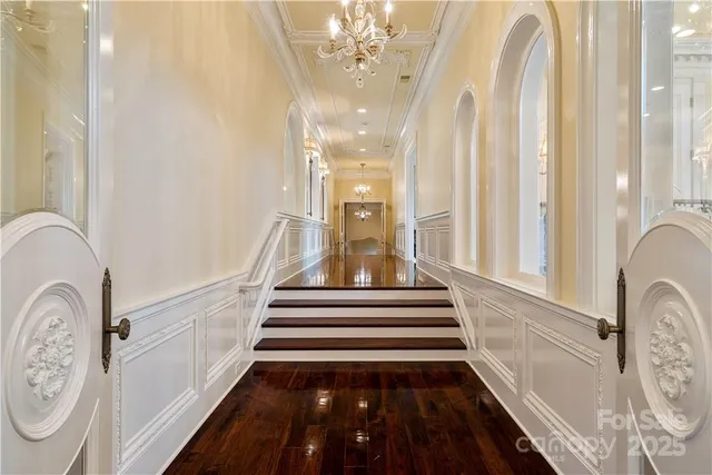 a bathroom with a sink mirror and bathtub