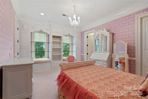 a kitchen with cabinets appliances and a window