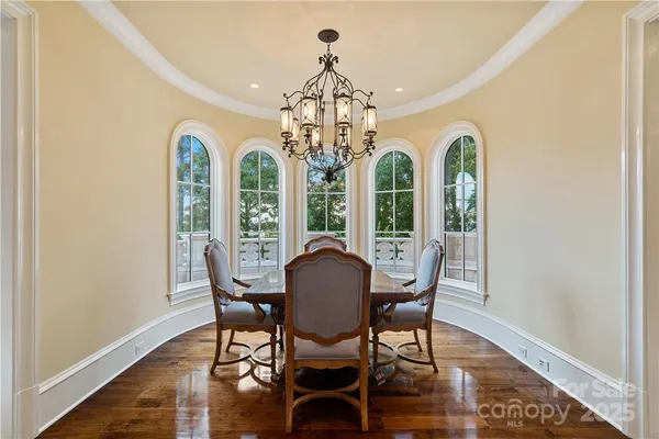 a view of a house with a porch and furniture