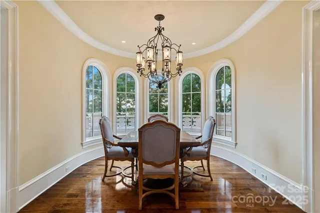 a view of a house with a porch and furniture