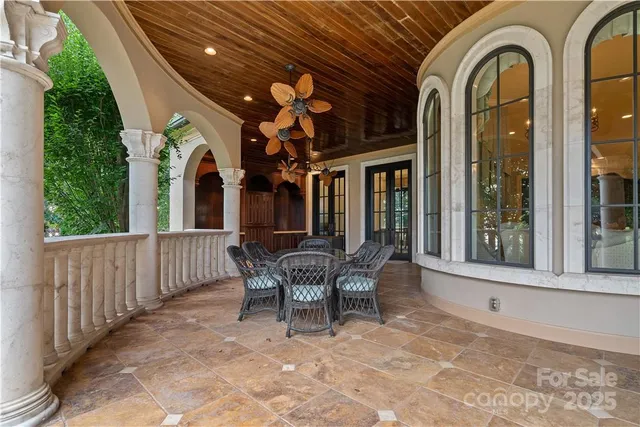 a front view of a house with a yard fountain