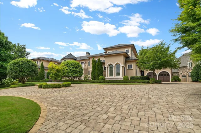 a vase of flowers sitting on a floor