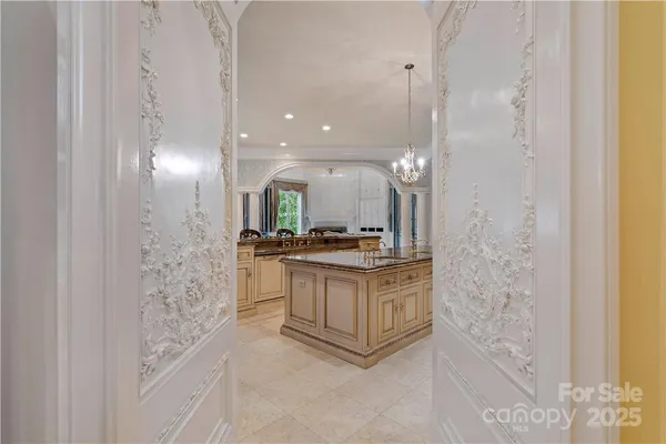 a bathroom with a sink and a large mirror