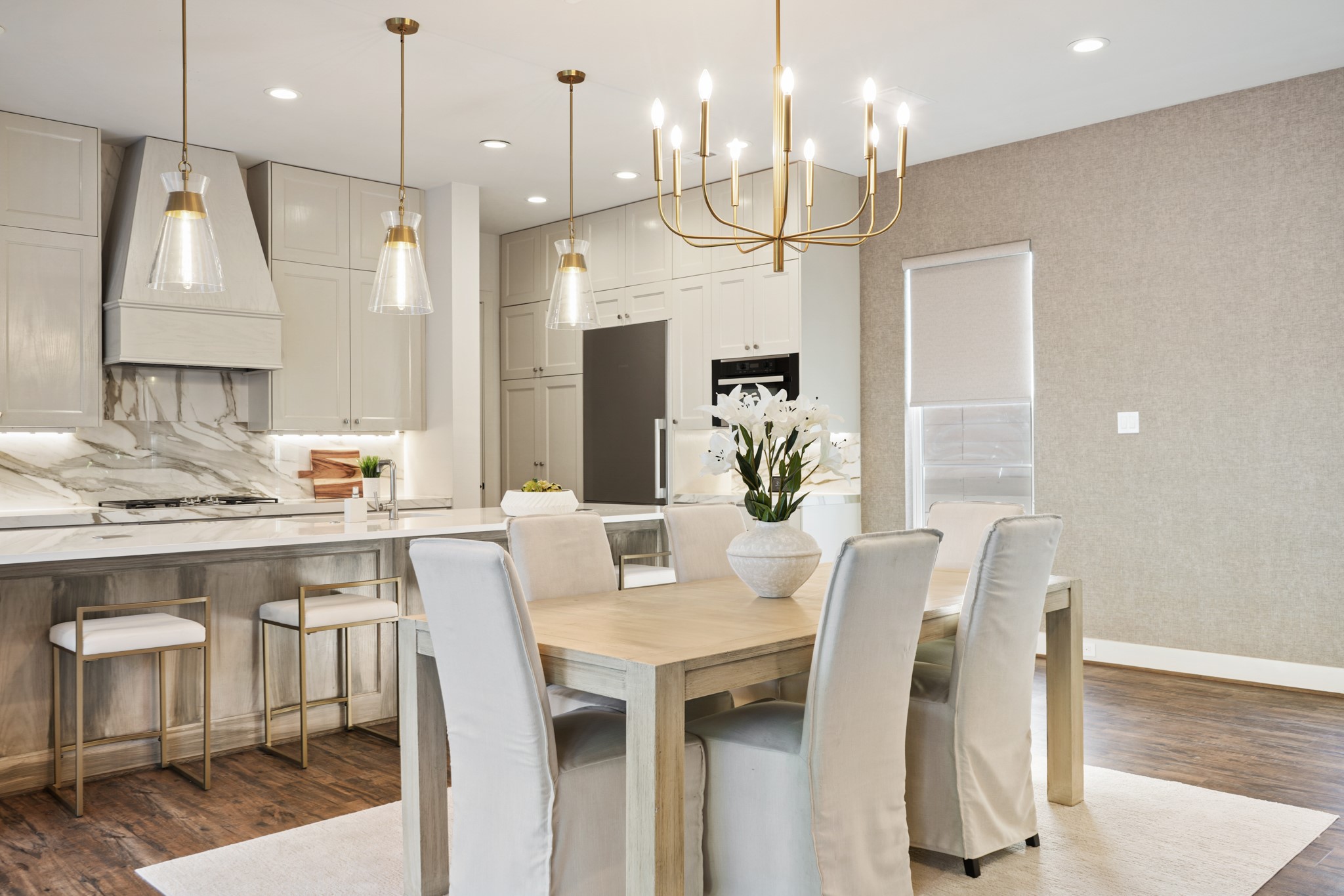 5434 Windswept Lane Houston, TX 77056 - Photo 17 of 45 Dine with elegance under this stunning chandelier.