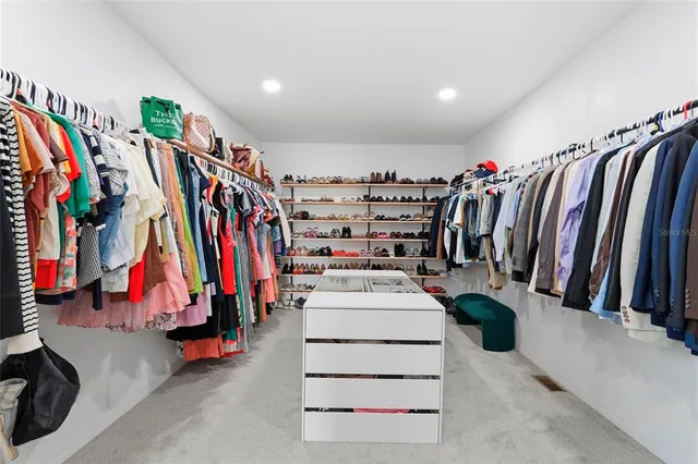 a view of a terrace with yard and mountain view in back