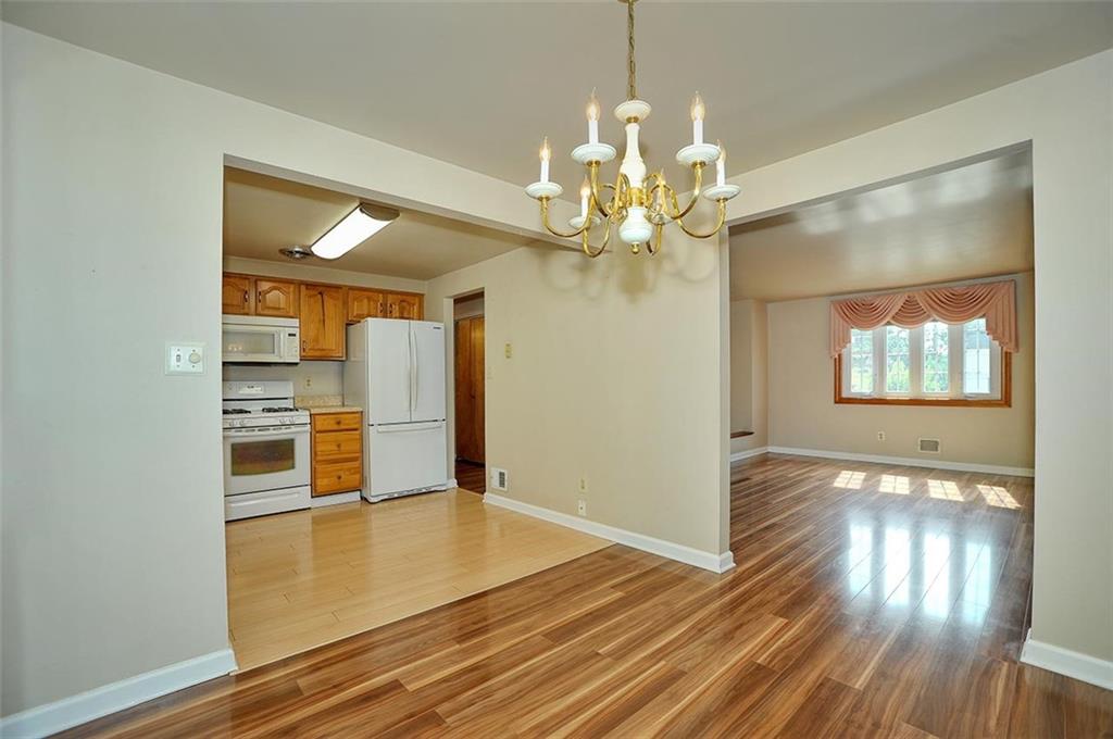1088 Fiddleback Drive McKees Rocks, PA 15136 - Photo 8 of 24 a view of a livingroom with wooden floor