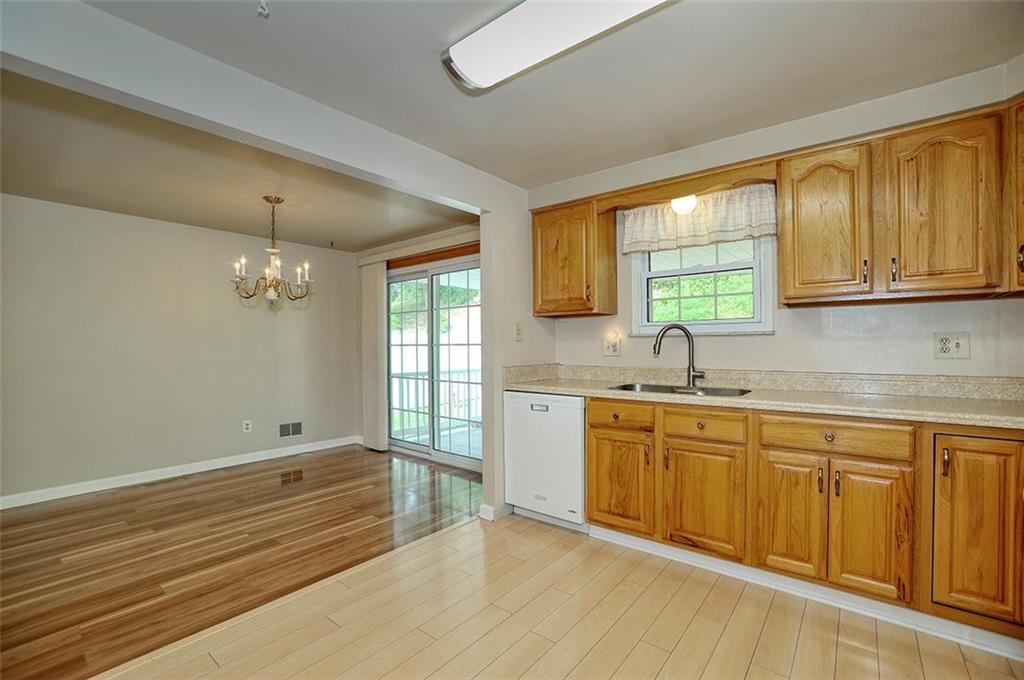 1088 Fiddleback Drive McKees Rocks, PA 15136 - Photo 10 of 24 a spacious bathroom with double vanity and a window