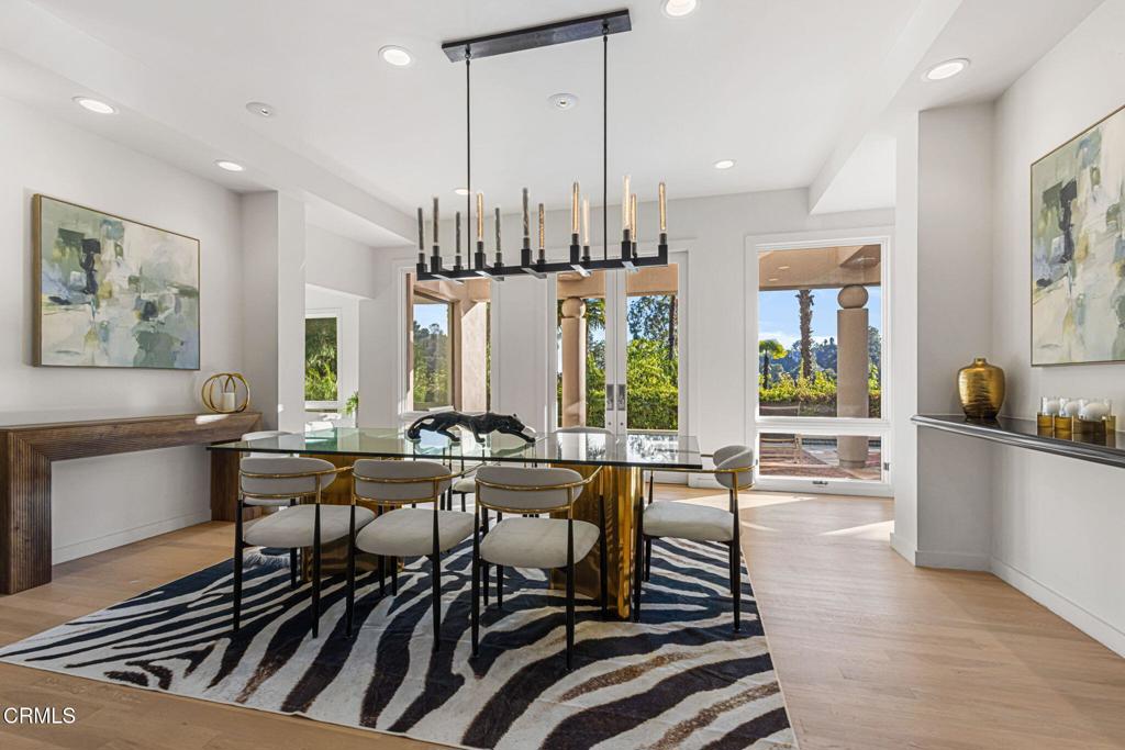1265 Chateau Road Pasadena, CA 91105 - Photo 5 of 64 a view of a kitchen with dining room and wooden floor