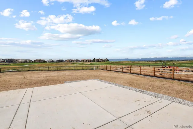 a view of an ocean and city