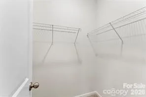 a picture of a bathroom with a shower