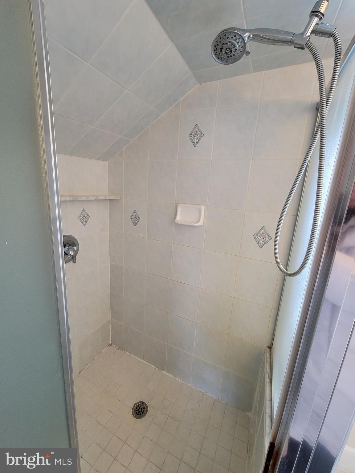 110 Gumbes Road Oaks, PA 19426 - Photo 13 of 13 a bathroom with a glass shower door
