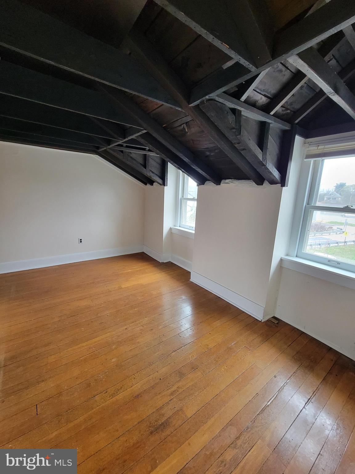 110 Gumbes Road Oaks, PA 19426 - Photo 9 of 24 a view of a room with wooden floor and windows
