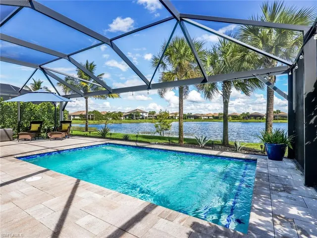 a view of swimming pool with a patio