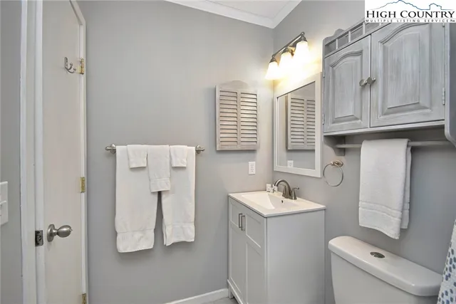 a bathroom with a sink toilet and tub