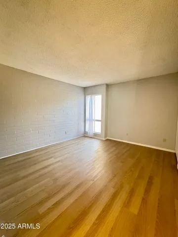 a view of an empty room and window