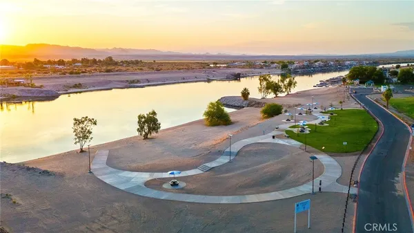 a view of a swimming pool with an outdoor seating