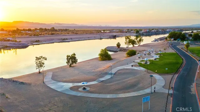 a view of a swimming pool with an outdoor seating