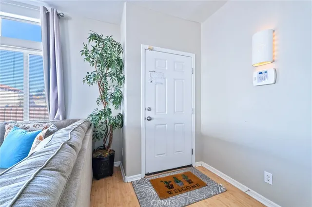view of living room with furniture and flowers