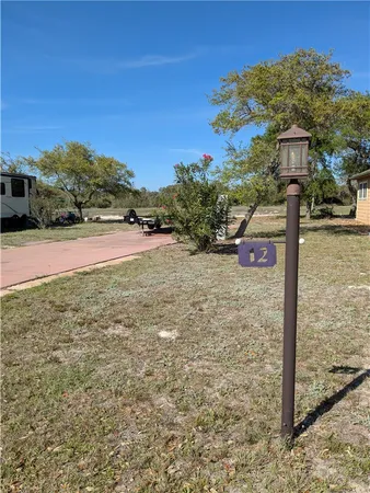 a view of a street with an ocean view