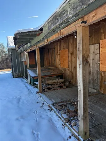 a view of a backyard of the house
