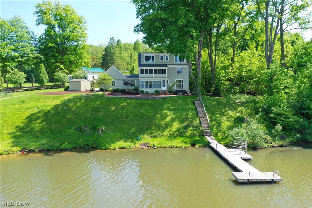 7421 Diagonal Road Kent, OH 44240 - Photo 39 of 48 Dock area with a yard and a water view