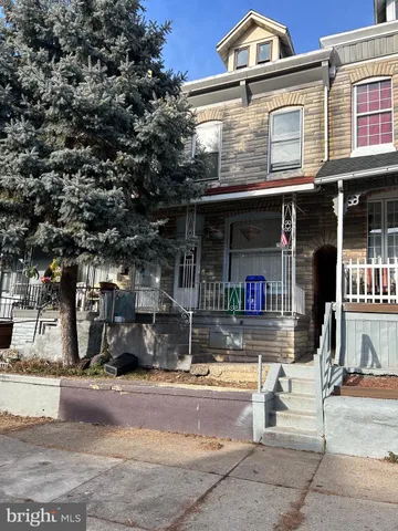 a front view of a building with street