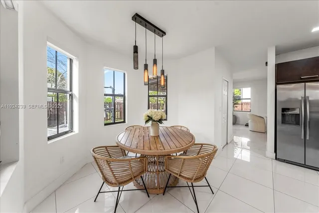 a spacious bedroom with a bed and couch