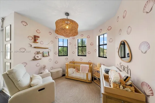 a spacious bedroom with a bed and a couch