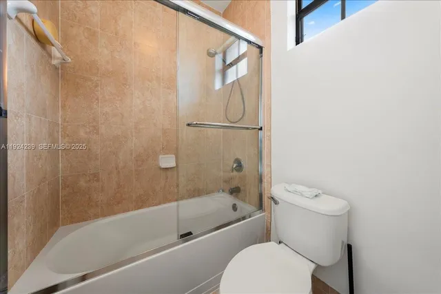 a workspace with furniture hardwood and a window