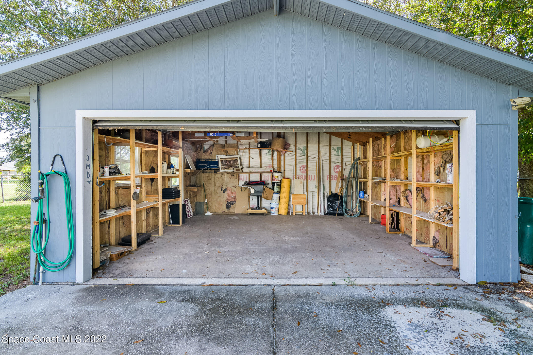 1861 Trimble Road Melbourne, FL 32934 - Photo 4 of 46 a view of a house with a outdoor space