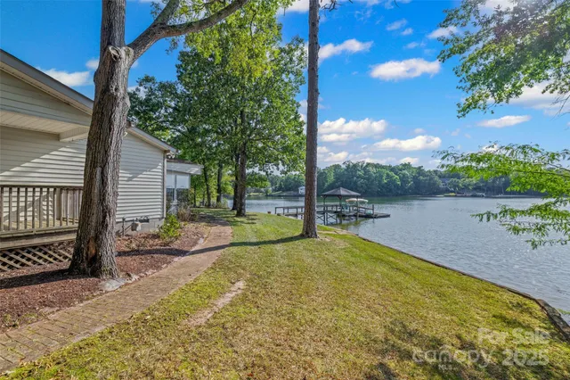 a view of a swimming pool with a patio