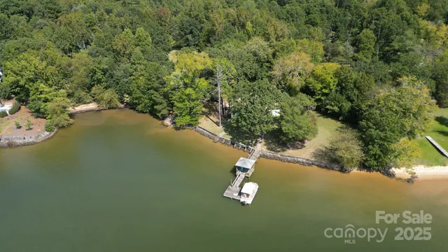 a view of a lake with a yard