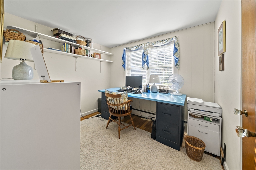 12 Dix Road Woburn, MA 01801 - Photo 20 of 33 a room with furniture a desk and a window