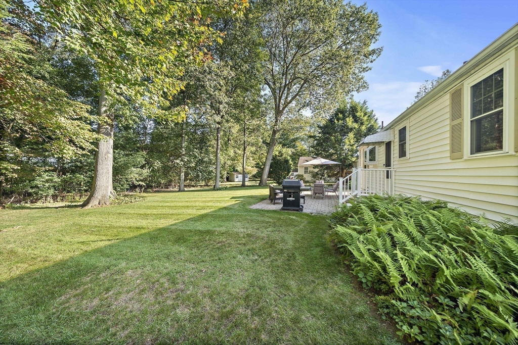 12 Dix Road Woburn, MA 01801 - Photo 25 of 33 a view of a house with backyard