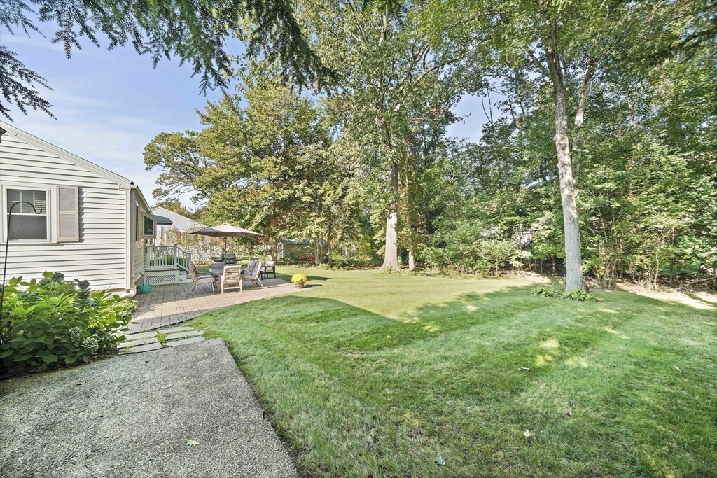 12 Dix Road Woburn, MA 01801 - Photo 26 of 33 a view of a yard with plants and trees
