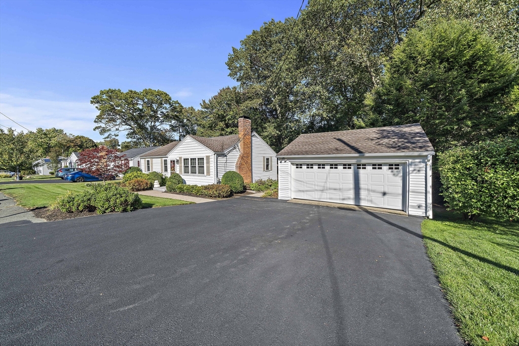 12 Dix Road Woburn, MA 01801 - Photo 33 of 33 a view of house with outdoor space and garden