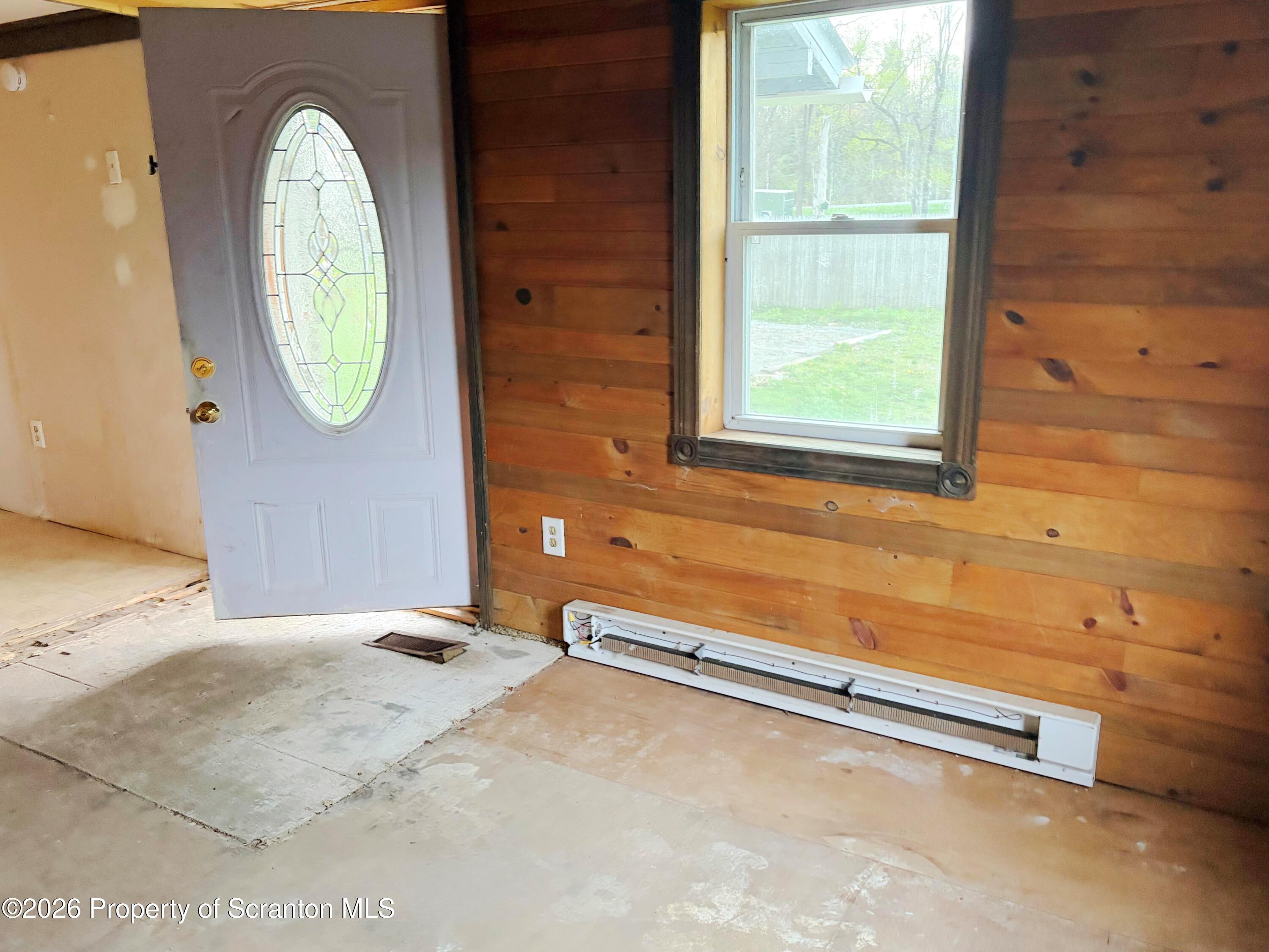 2466 State Rte 4002 Mehoopany, PA 18629 - Photo 7 of 11 a bedroom with a bed and a window
