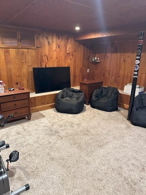 129 Conant Street Danvers, MA 01923 - Photo 12 of 14 a room with furniture and a flat screen tv