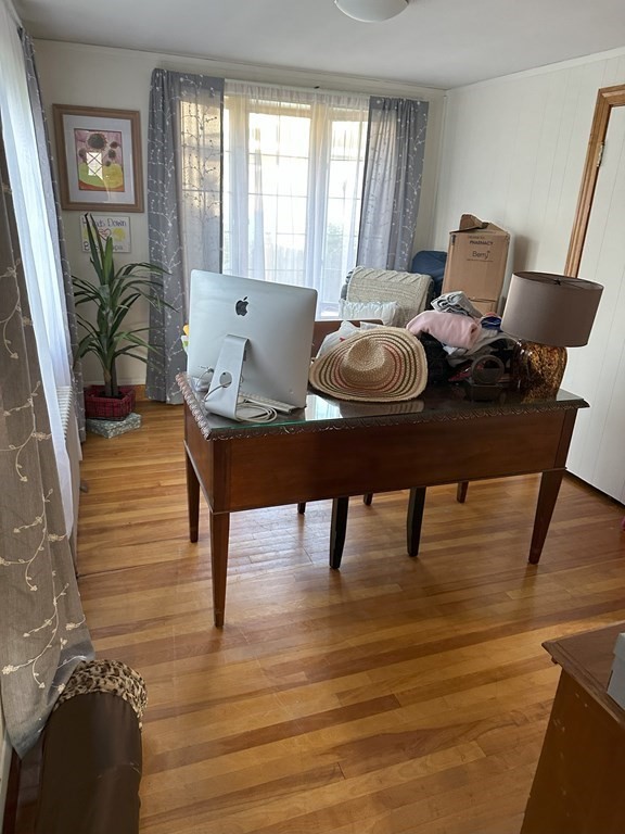 129 Conant Street Danvers, MA 01923 - Photo 7 of 14 a view of a dining room with furniture and wooden floor